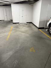 Parking garage featuring baseboards