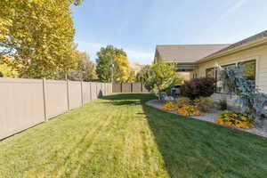 View of fenced backyard.