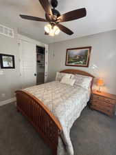 2nd Bedroom, Carpeted bedroom with ceiling fan and a closet.