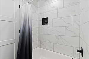 Bathroom with shower / tub combo