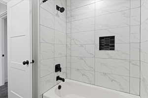 Bathroom featuring shower / bathtub combination