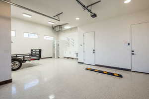 RV Garage with baseboards and recessed lighting