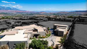 Aerial view of residential area featuring a mountain backdrop