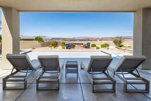 Fenced backyard with a patio area