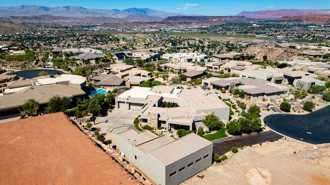 Aerial view of residential area with a mountainous background