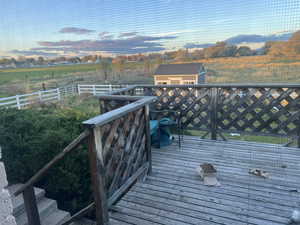 Deck featuring a storage unit