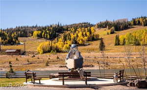 Surrounding community with a view of rural / pastoral area and a patio