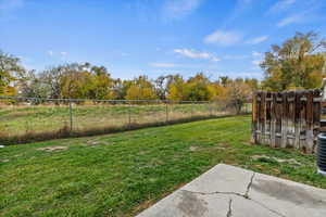 View of yard featuring view of wooded area