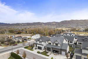 Aerial view of residential area featuring mountains