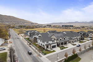 Aerial view of residential area with a mountainous background