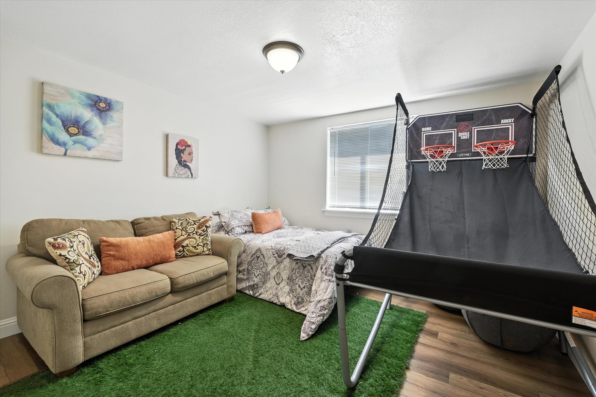 Bedroom featuring wood finished floors