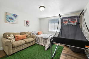 Bedroom featuring wood finished floors