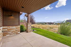 View of patio / terrace featuring a mountain view