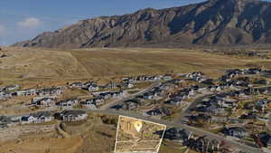 View of mountain background featuring nearby suburban area