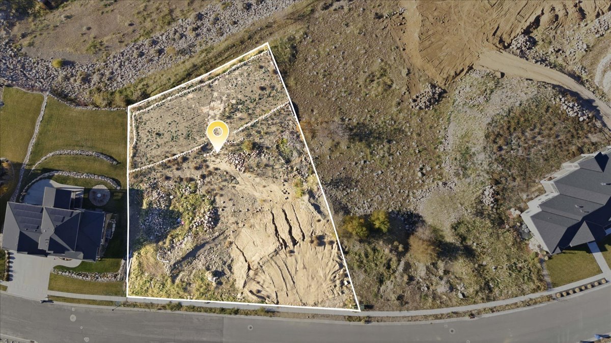 Aerial view of property and surrounding area with property boundaries highlighted