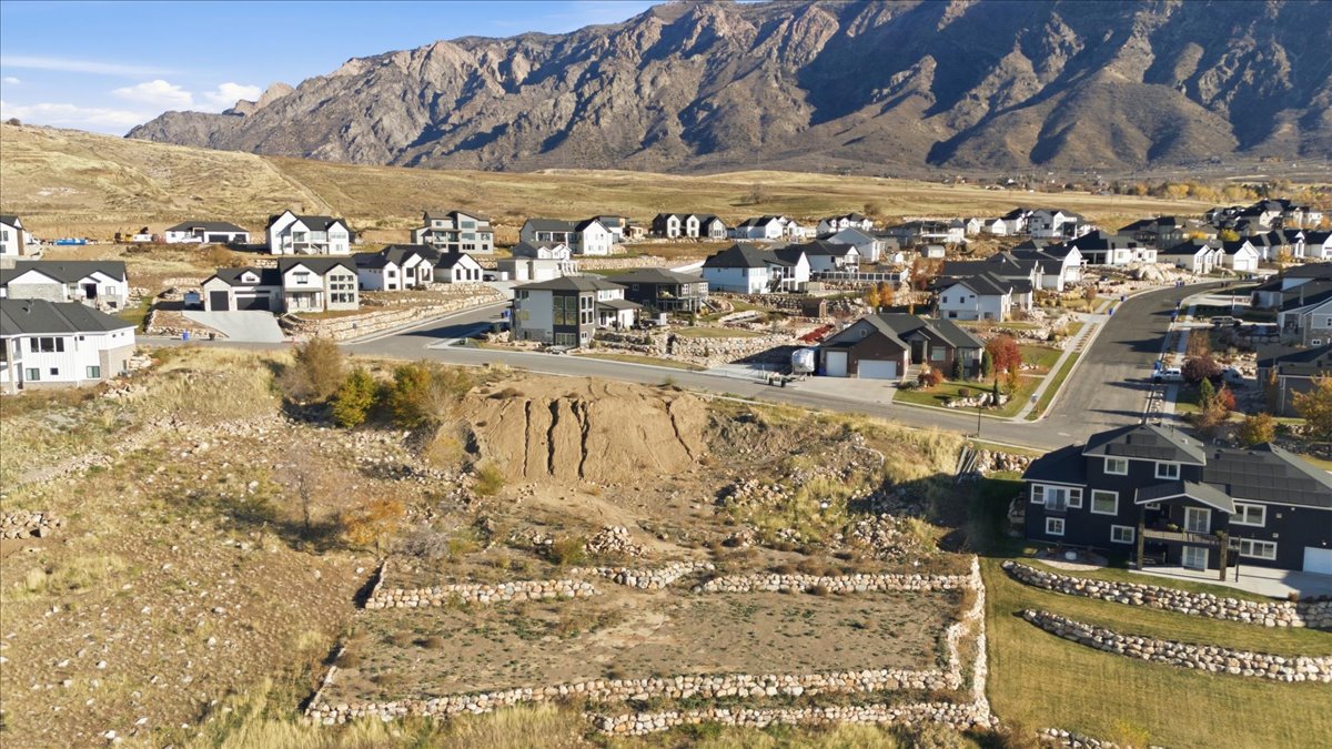 View of mountain backdrop with nearby suburban area