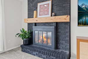 Detailed view of carpet floors and a fireplace
