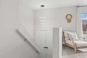 Sitting room with carpet flooring