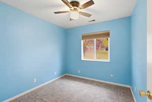 Bedroom featuring carpet floors and ceiling fan