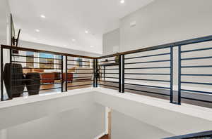 Corridor featuring recessed lighting