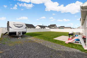 View of fenced backyard