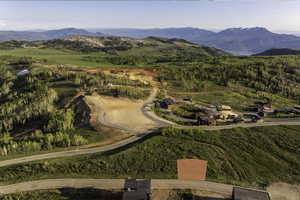 Aerial overview of property's location with mountains
