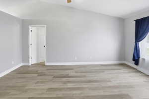 Living room area, doorway to 5th bedroom or office