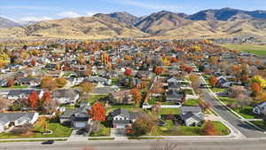 Aerial perspective of neighborhood featuring mountains