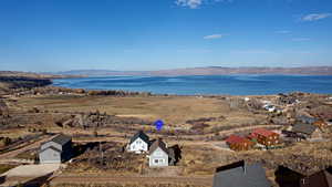 Aerial view of residential area with a water and mountain view