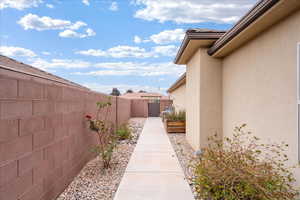 Fenced backyard with a gate