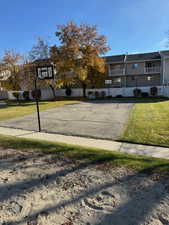 View of basketball court featuring basketball hoop