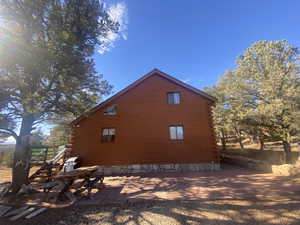 View of side of property with log siding