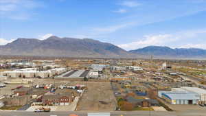 View of mountain backdrop with industrial structures