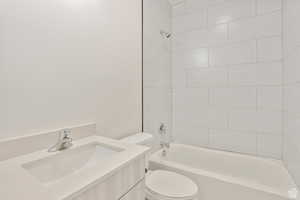 Full bathroom featuring vanity and bathing tub / shower combination