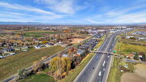 Aerial view of property's location with a main thoroughfare