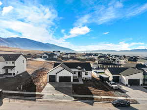 View of mountain background featuring nearby suburban area
