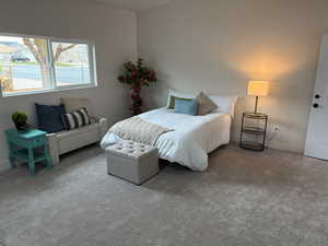 Bedroom featuring carpet flooring