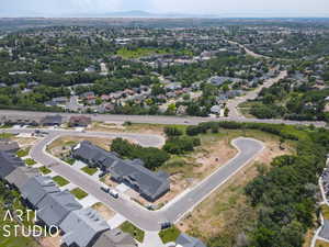 Aerial overview of property's location featuring nearby suburban area