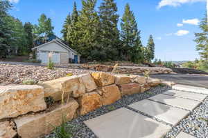 View of yard featuring a garage