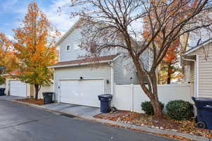 View of home's exterior with a garage
