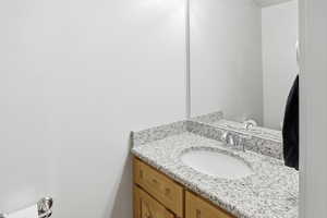 Half bath featuring vanity