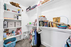 2nd Bedroom Spacious closet with carpet
