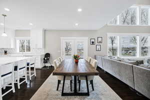 Dining room featuring recessed lighting and dark wood-type flooring