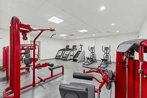Exercise room featuring recessed lighting and a paneled ceiling