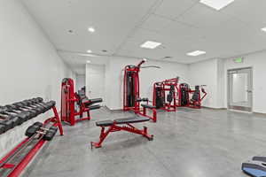 Workout area featuring a paneled ceiling