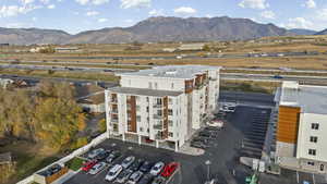 Aerial view of mountains and apartment complex