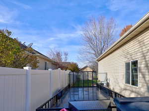 View of fenced backyard