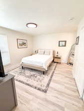 Bedroom featuring light wood-style flooring