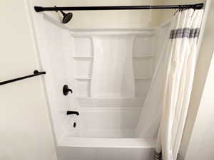 Full bathroom featuring shower / tub combo