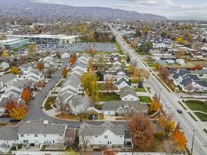 Aerial perspective of suburban area featuring a mountain backdrop